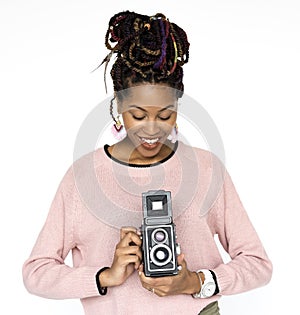 African descent woman hold camera in a shoot