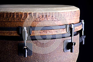 African Djembe on a Black Bk