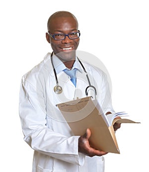 African doctor reading a medical record