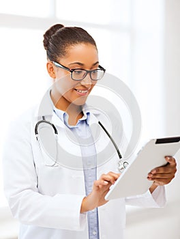 African doctor with tablet pc