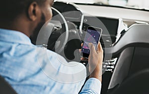 African Driver Using Smartphone With Car Navigation App Driving Auto