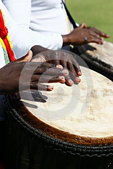 African drummer playing a djenbe