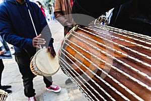 African drummers blowing their bongos on the street