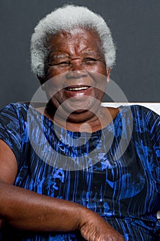 African elderly woman laughing