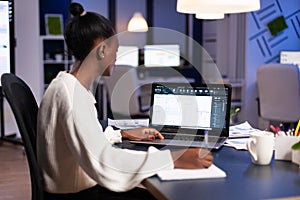 African engineer constructor designer architect analysing new bluilding plan