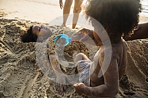 African family enjoying the beach