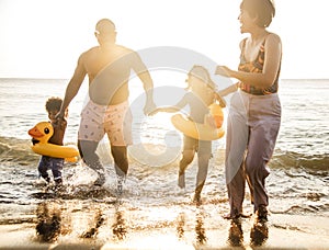 African family enjoying the beach