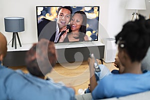 African Family Watching TV Movie photo