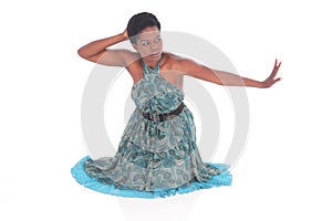 African female in a blue dress dancing