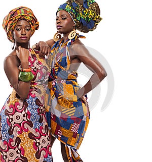 African female models posing in dresses.