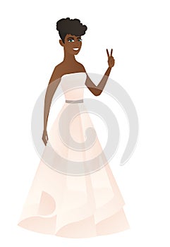 African fiancee showing the victory gesture.