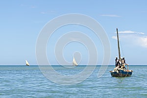 African fishermen dowse sail