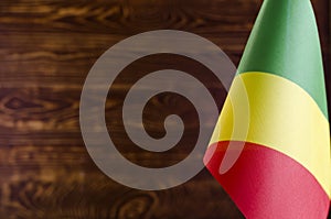 African flags Fragment of the flag of the Republic of the Congo in the foreground space for text blurred background flag of the Re