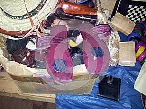 African genuine leather sandals and wallets in a market