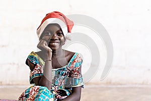 African Girl Happily Smiling in Christmas Hat Portrait with Copy Space