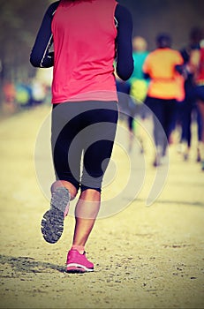 African girl runs footrace with vintage effect