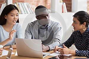 African guy asian and indian girls do assignment together