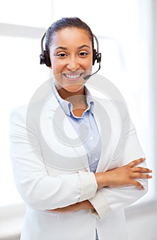 African helpline operator with headphones