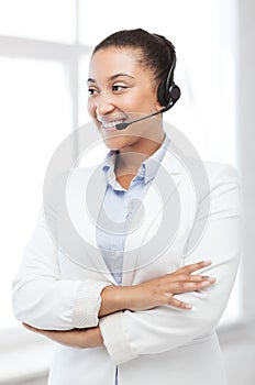 African helpline operator with headphones