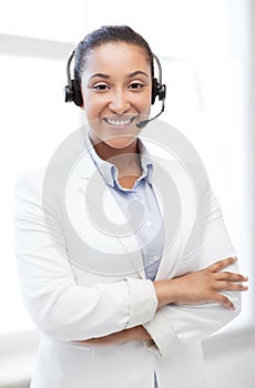 African helpline operator with headphones