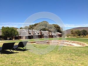 African holiday huts with a braai area photo