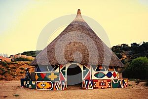 African hut in village photo