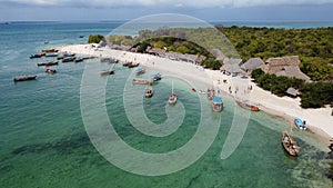 African island with dhows anchored photo