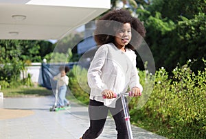 African kid girl smile portrait and happy in holiday weekend at home.