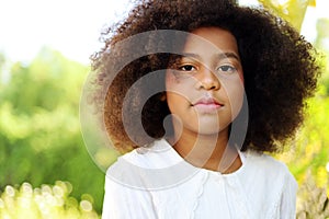 African kid girl smile portrait and happy in holiday weekend at home.