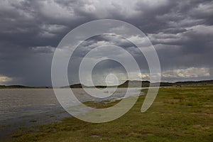 African landscape - Rustfontein Dam in South Africa and the plain at the dam before storm