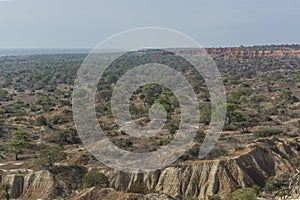 African landscape, small mountains on ocean coast photo