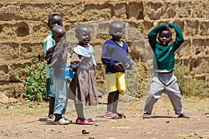 African little children play on a street