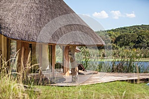 African lodge by lake photo