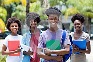 African male student with group of african american students