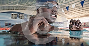 African man, athlete and goggles in swimming pool for speed, cardio or ready for global competition. Person, athlete and