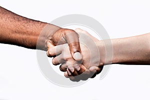 African man and Caucasian woman shake hands, studio shot, isolated