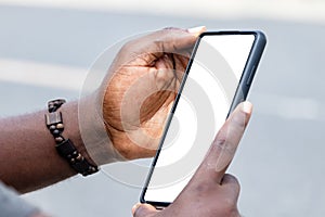 African man hands holding two smartphone with blank space screen for your texting or news content