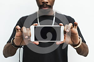 African man holding mobile phone mockup