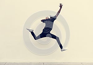 African man jumping in the air