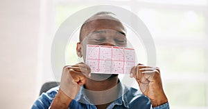 African Man Kissing Gamble Ticket