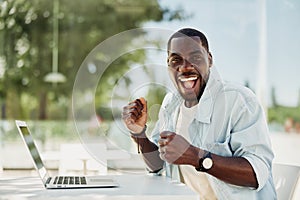 African man laptop job business person male sitting adult lifestyle technology happy businessman computer