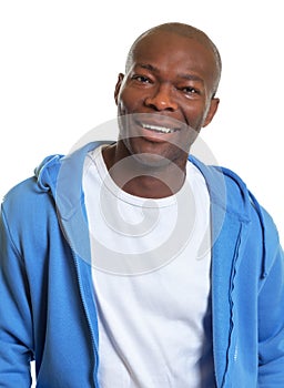 African man laughing after workout
