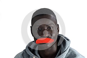 African man with mouth covered on white