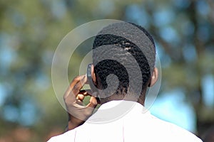 African man on phone