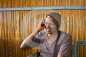 African man on phone