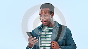 African man, phone and surprise news in studio with smiling, happy and mockup by blue background. Black guy