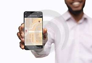 African Man Showing Smartphone With Mobile Navigation App, White Background