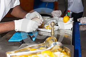 African man shucking oysters for sale