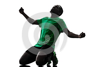 African man soccer player celebrating victory silhouette