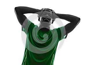 African man soccer player despair loosing silhouette